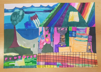 Ein buntes, selbstgemaltes Bild aus der Kunst AG der Grundschule Neuenhaus, das ein Haus zeigt.